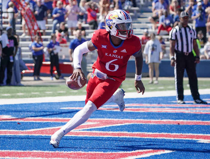 Sep 24, 2022; Lawrence, Kansas, USA; Kansas Jayhawks quarterback Jalon Daniels (6) drops back to pass against the Duke Blue Devils during the second half of the game at David Booth Kansas Memorial Stadium.